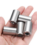 Hand holding four-piece stainless steel spacer set of four five sixteenth inch bore five eighths inch outer diameter one inch length spacers.