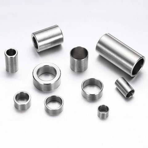 Assorted sizes of stainless steel spacers on white background, including Four Pcs M20 304 Stainless Steel Spacers ID 20mm OD 25mm.
