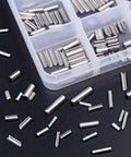 Durable 304 Stainless Steel Slotted Spring Pin Assortment Kit 180 Pcs In M2 M2.5 M3 M4 Sizes With Transparent Storage Box on table