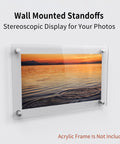 Wall-mounted standoff screws displaying sunset photo without acrylic frame included.