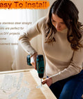Woman using a drill with ✝️ 24 Pack 1.42” x 0.63” Flat Bracket Straight Brace - Stainless Steel Heavy Duty Mending Plate for Wood Furniture, DIY Repair with Screws Included (White) on a table.