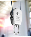 Close-up of 3pcs Heavy Duty Stainless Pulley Swivel Lifting Wire Rope Crane for Construction DIY Projects in use.