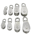 Array of various sizes of stainless steel pulleys with swivel heads, including Single Swivel Lifting 0.3" Rope Pulley Roller Block Sheave 0.03 Ton(M20 Double)