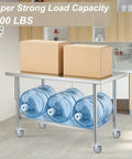Four Inch Universal Adjustable Caster Wheels Set With Brakes For Tube Legs From 7/8 Inch To 1-5/8 Inch supporting a heavy stainless steel table with bottles and boxes