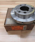 Heavy Duty Taper Lock Hub Two Seven Eighths Inch Stainless Steel For Rexnord 70 HTI STI 7300780 with box on wood surface
