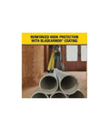 Heavy Duty Tape Measure, 25-Foot (33-725) extended over PVC pipes, showcasing reinforced hook protection with BladeArmor coating.