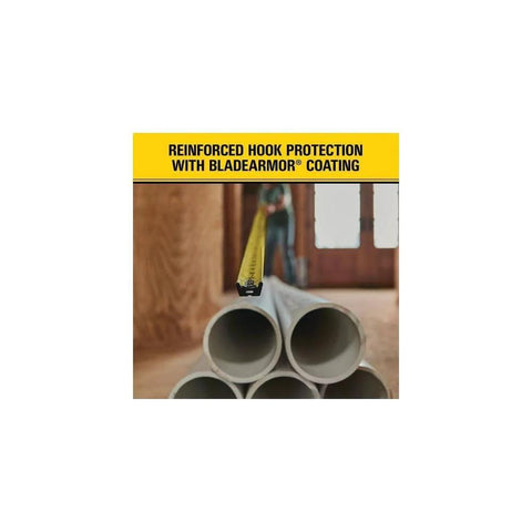 Heavy Duty Tape Measure, 25-Foot (33-725) extended over PVC pipes, showcasing reinforced hook protection with BladeArmor coating.