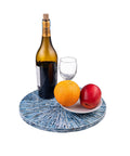 12.6 inch mother of pearl lazy susan turntable with blue starburst design, showcasing fruits and wine for countertops.