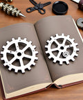 Steampunk Gear Die Cuts For Card Making And Scrapbooking, Metal Cutting Dies For Embossing And Cut Outs, on a book background