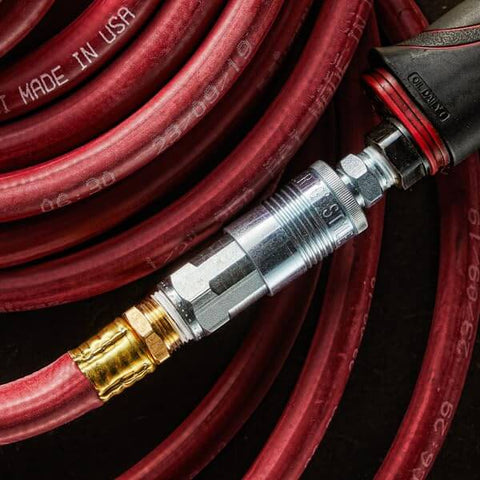 G Style Quick Connect Air Coupler Half Inch FNPT Steel Construction with Drag Guard connected to red air hose