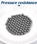 610 Piece Ball Bearings Set Loose Steel Bearings In Six Sizes displayed on plate