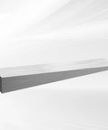 A single steel flange wedge from the 12 Piece Steel Flange Wedges Set, 4 Inch Long, 3/4 Inch Wide, 1/2 Inch Thick, Metal Wedge Shims.