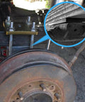 2 Inch Wide 4 Degree Steel Leaf Spring Shims on Suspension Axle with Rust Resistant Black Oxidized Carbon Steel Shims Installed