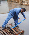 Worker using Deluxe Steel Pallet Buster With 41 Inch Handle For Easy Pallet Disassembly And Dock Board Removal, Heavy Duty, Blue