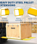Forklift with heavy duty steel pallet extensions lifting a wooden crate in a warehouse, showing all-steel construction detail.