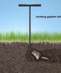 Hardcore 48 Inch Adjustable Soil Probe With T Handle All Steel Ground Rod locating gopher holes in a grassy soil.