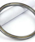 VC065CP0 Thin Section Bearing 6-1/2" x 7-1/4" x 3/8" inch close-up view showing steel construction and brass cage.
