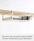 Home Plate Under Shelf Storage Rack - Cabinet Organizer - Steel installed on wooden shelf with boxes and foil.
