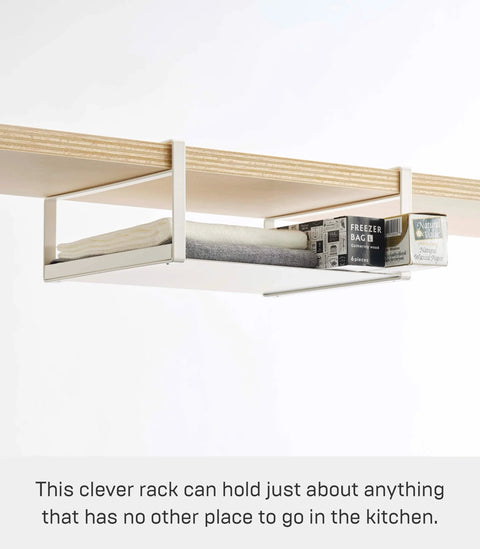 Home Plate Under Shelf Storage Rack - Cabinet Organizer - Steel installed on wooden shelf with boxes and foil.