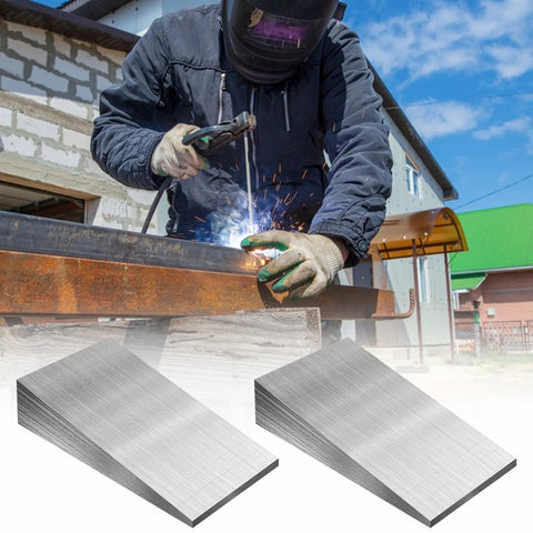 Welder using 8-Piece Steel Flange Wedge Shims Set For Precision Alignment And Welding, showing Pro-Grade LOYORTY Triangle Slope Wedges.