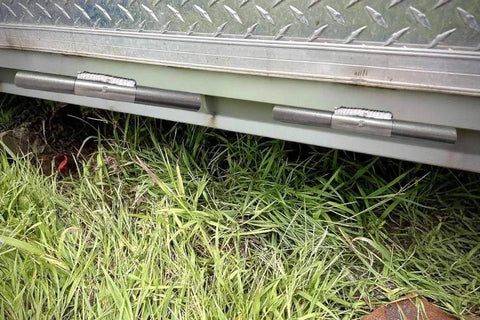 10 Inch Weld On Trailer Ramp Hinge Heavy Duty Greaseable Ramp Door Hinges 2 Pack installed on trailer ramp