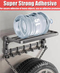 Extreme 1.18 Inch Double Sided Mounting Tape Heavy Duty Adhesive That Sticks Like Crazy holding shelf with water bottle, tire below