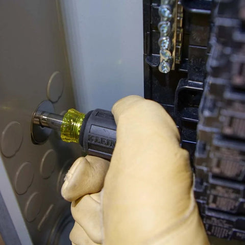 Using 6-In-1 Stubby Screwdriver And Nut Driver with Interchangeable Shaft on electrical panel, non-magnetic nut driver set