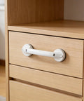 White Strong Suction Cup Handle No Drilling Installation for cabinets, shown on wood cabinet.