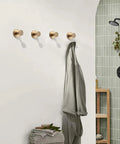 Heavy Duty No Drill Suction Cup Hooks For Shower And Bathroom, 304 stainless steel wall mounts holding towels, installed on tiled wall.