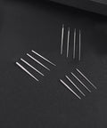 Twelve Piece Surgical Steel Piercing Taper Set 20G 18G 16G 14G External Threaded Internal Threaded Push In Threadless on black surface