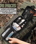 170 Piece Survival First Aid Kit With Trauma Gear For Hiking Camping And Backpacking held open, showing contents against a backpack.
