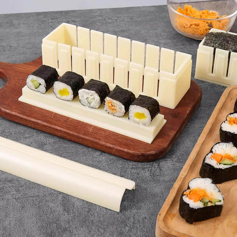 Complete Sushi Making Kit With 3 Shape Molds Rice Roller Tool and Spatula for pro-looking home rolls, showcasing sushi on a board.