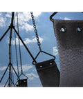 Playground swings with chains against a blue sky, featuring 1/4 x 15 ft. Zinc-Plated Straight Link Coil Chain 520 lb. Safe Working Load, 519171.