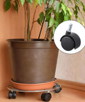 Five Pieces One Point Five Inch Swivel Caster Wheels Set With M8 Circlip Stem 360 Degree Black Plastic Casters For Cabinets Tables Shelves Trolleys Heavy Duty Furniture Replacement Smooth Rolling For Home And Office Use, close-up of caster wheel under plant pot holder.