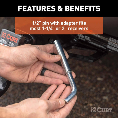 Swivel Trailer Hitch Pin With Integrated Clip One Half Inch Diameter With Five Eighths Inch Adapter in hand near receiver