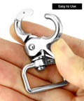 Person holding heavy duty trigger snap from Swivel Snap Hooks 360 Degree Rotation Heavy Duty Trigger Snaps Nickel Plated For Leashes And Tacks 20 Pack