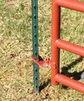 Patented T Post Hinge Pins for easy gate hanging from metal T posts, shown installed on a red gate with green T post outdoors.