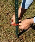Installing Patented T Post Hinge Pins For Easy Gate Hanging From Metal T Posts Made In USA in outdoor setting
