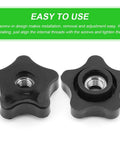 Two black five-star knobs showcasing visible threaded holes, part of Four Pack T Track Knobs For Sawing And Drilling Machines Through Hole Three Eighths Inch Durable Five Star Through Threaded Knurled Star Shaped Nuts Made From Plastic And Carbon Steel With Polished Finish Plastic Screw On Type Black.
