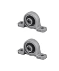 Two metal shaft supports from 16pcs/pack t8 lead screw kit, used for 3D printers and DIY CNC machines, ensuring steady alignment and smooth motion.