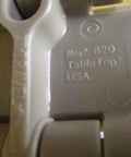 Close-up of Tabletop Industrial Chain By Rexnord With One And A Half Inch Pitch And Three Fourteenth Inch Width Tan Color Heavy Duty