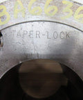 Top view of Heavy Duty Taper Lock Hub Two Seven Eighths Inch Stainless Steel For Rexnord 70 HTI STI 7300780 With One Half Inch By Three Quarter Inch Keyway One Quarter Inch Npt Nine And A Quarter Inch Outer Diameter Three And A Half Inch Thick Power Transmission showing the taper-lock engraving.