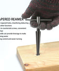 Pro Grade Tapered Reamer Set With T Handle in use on wood, demonstrating chamfering function and precision control.