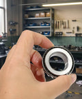 L44643/L44610 Tapered Roller Bearing Cone and Cup, 1.0000" Bore x 1.9800" OD x 0.5906" Thick Chrome Steel held in hand