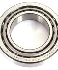 Two piece cone and cup tapered roller bearing set LM603049 LM603011 shown in a side view orientation.
