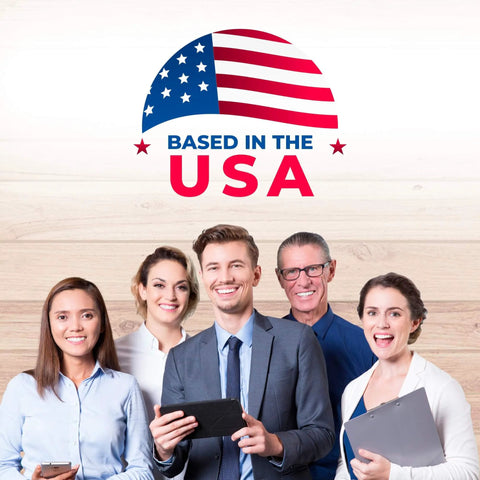 Group of professionals smiling under 'Based in the USA' text with American flag design on wood background.
