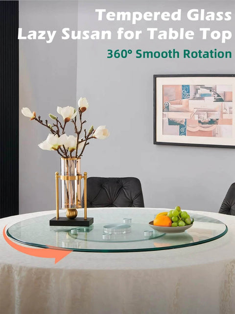 26.7 inch tempered glass lazy susan rotating serving tray on a dining table with smooth rotation, ideal for dining and parties.