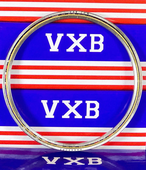 Slim Thin Section Ball Bearing 4" x 4-1/2" x 1/4" VA040CP0 chrome steel with bronze cage on display.
