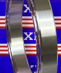VG060CP0 Thin Section Slim Ball Bearing 6" x 8" x 1" inch chrome steel ring side view with brass cage.