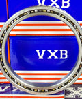 VD040CP0 Thin Section Bearing 4" x 5" x 1/2" Slim showing open design and brass cage against a blue background.